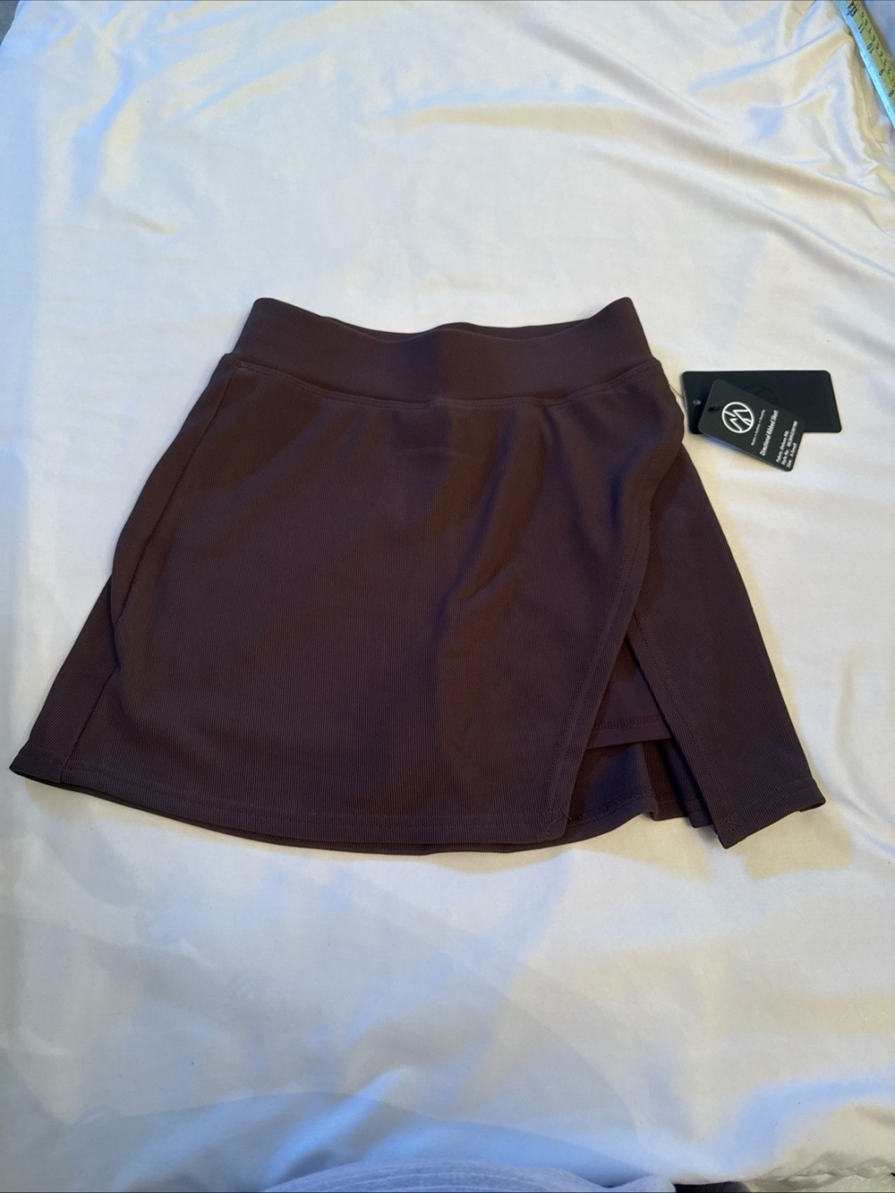Free People mini skort in dark plum